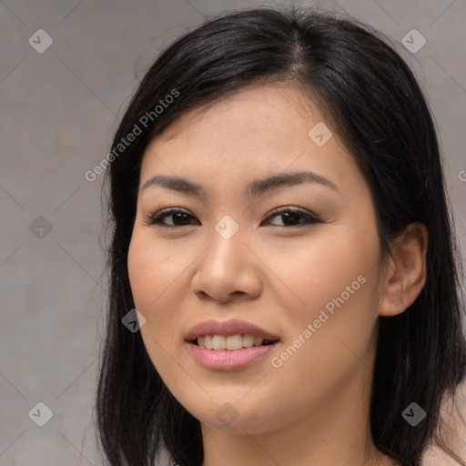 Joyful asian young-adult female with long  brown hair and brown eyes