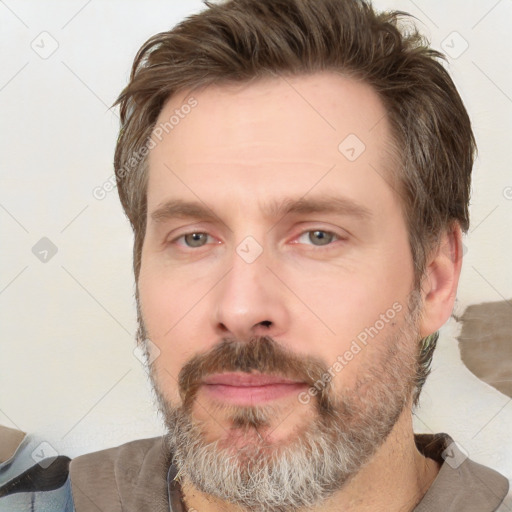 Neutral white adult male with short  brown hair and brown eyes