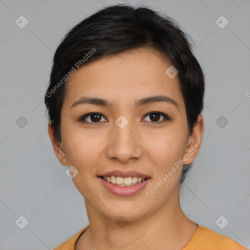 Joyful latino young-adult female with short  brown hair and brown eyes