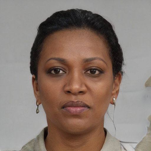 Neutral black young-adult female with short  black hair and brown eyes