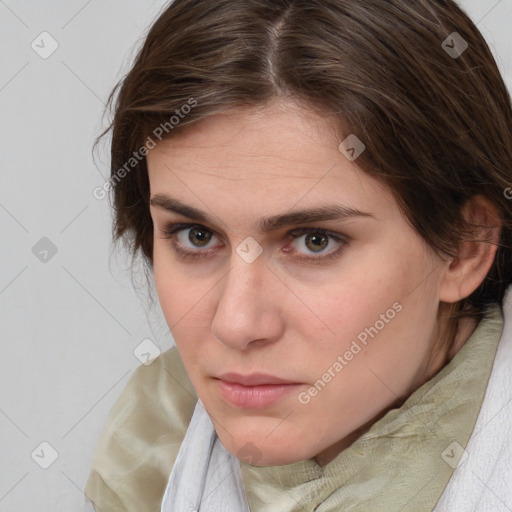 Neutral white young-adult female with medium  brown hair and brown eyes