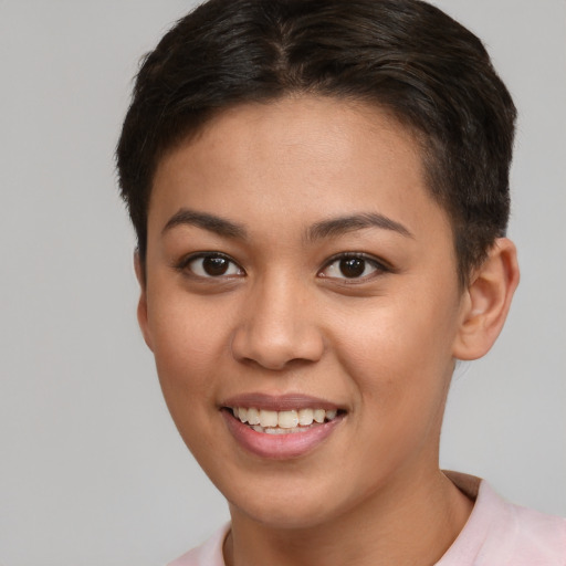 Joyful white young-adult female with short  brown hair and brown eyes