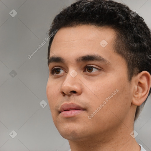 Neutral white young-adult male with short  black hair and brown eyes