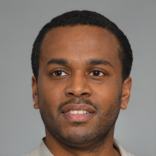 Neutral latino young-adult male with short  brown hair and brown eyes