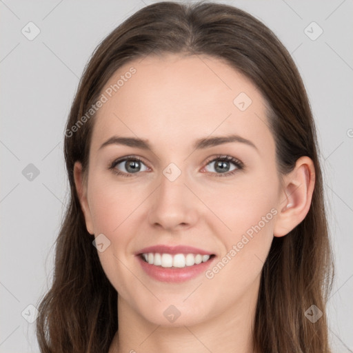 Joyful white young-adult female with long  brown hair and grey eyes