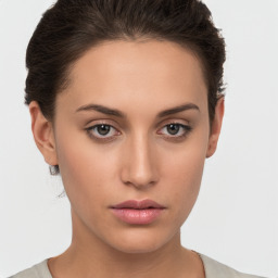 Neutral white young-adult female with short  brown hair and brown eyes