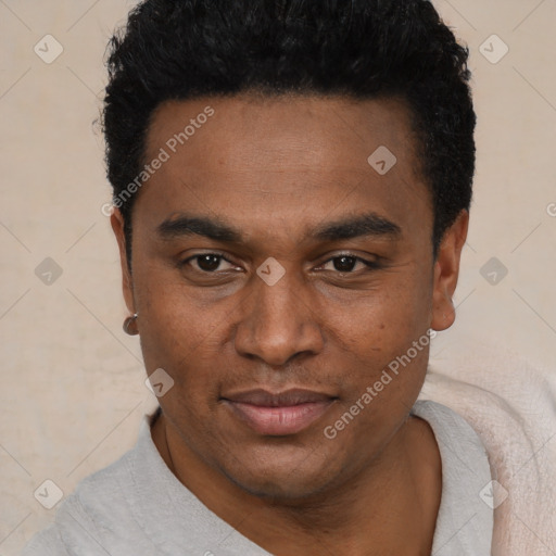 Joyful black young-adult male with short  black hair and brown eyes