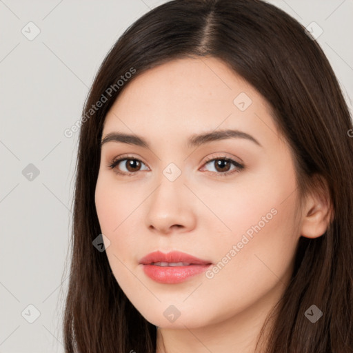 Neutral white young-adult female with long  brown hair and brown eyes