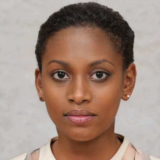 Neutral black young-adult female with short  brown hair and brown eyes