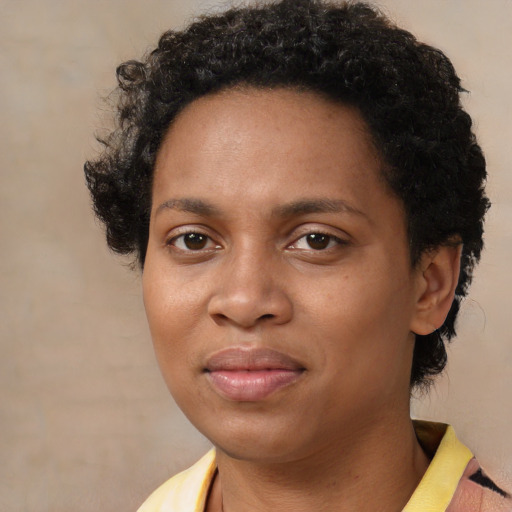 Neutral black young-adult female with short  brown hair and brown eyes