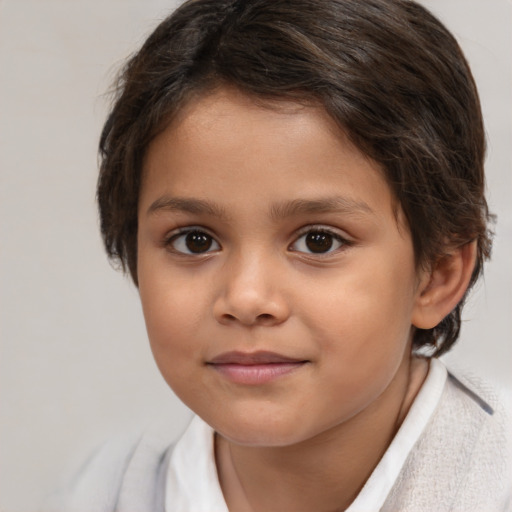 Joyful white child female with medium  brown hair and brown eyes