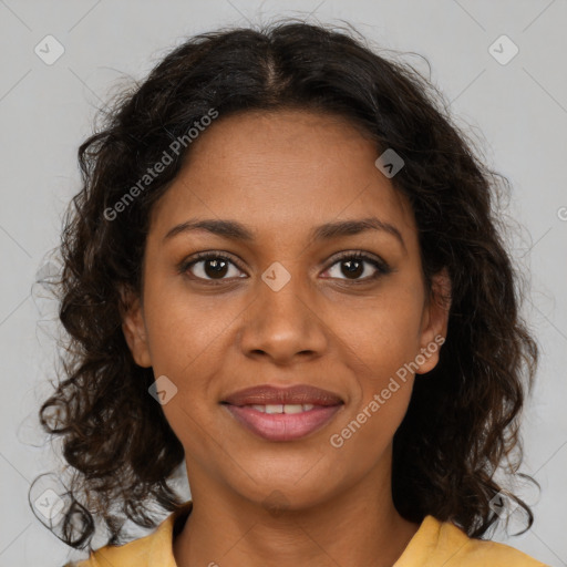 Joyful black young-adult female with medium  brown hair and brown eyes