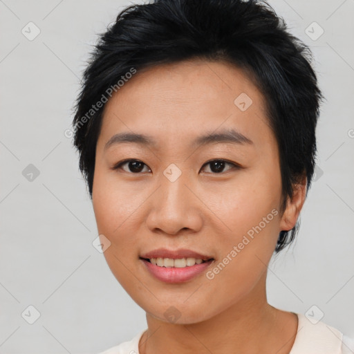 Joyful asian young-adult female with short  brown hair and brown eyes