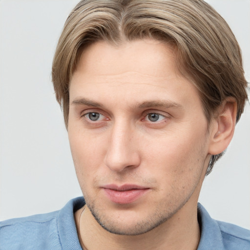 Neutral white young-adult male with short  brown hair and grey eyes