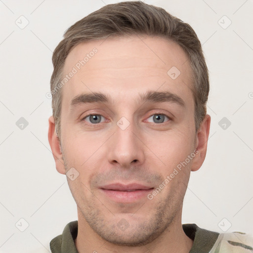 Neutral white young-adult male with short  brown hair and grey eyes