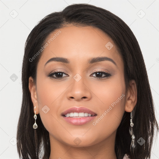 Joyful latino young-adult female with long  black hair and brown eyes