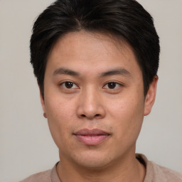 Neutral asian young-adult male with short  brown hair and brown eyes