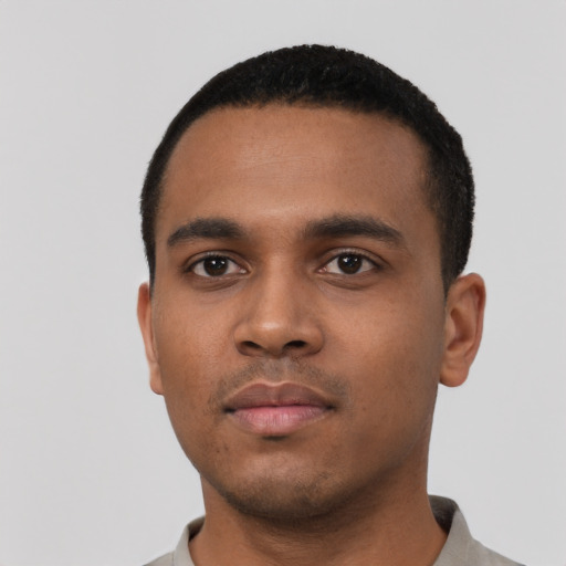 Neutral black young-adult male with short  black hair and brown eyes