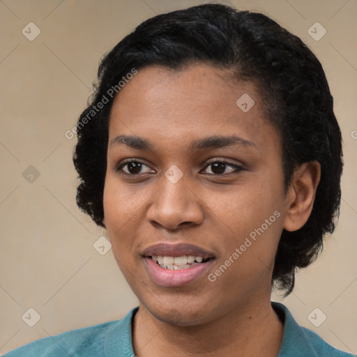 Joyful black young-adult female with short  black hair and brown eyes