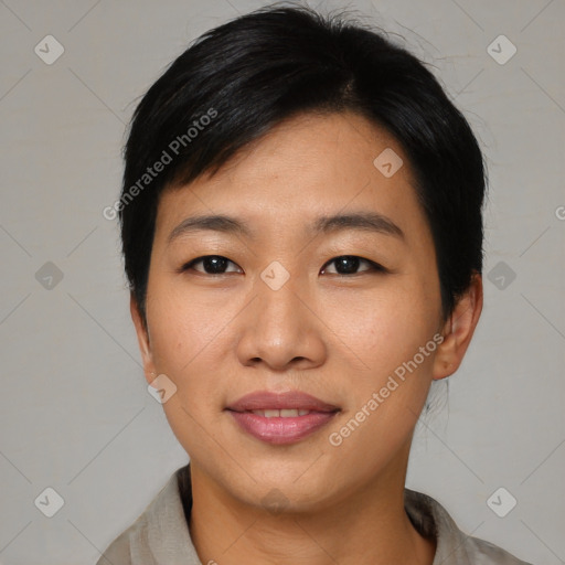 Joyful asian young-adult female with short  black hair and brown eyes