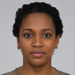 Neutral black young-adult female with short  black hair and brown eyes