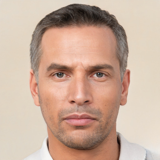 Neutral white adult male with short  brown hair and brown eyes