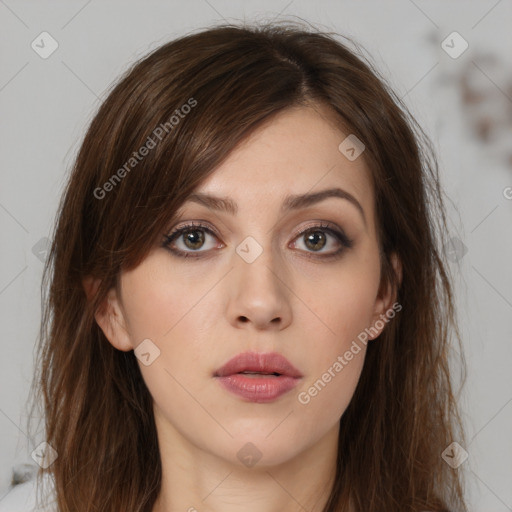 Neutral white young-adult female with long  brown hair and brown eyes