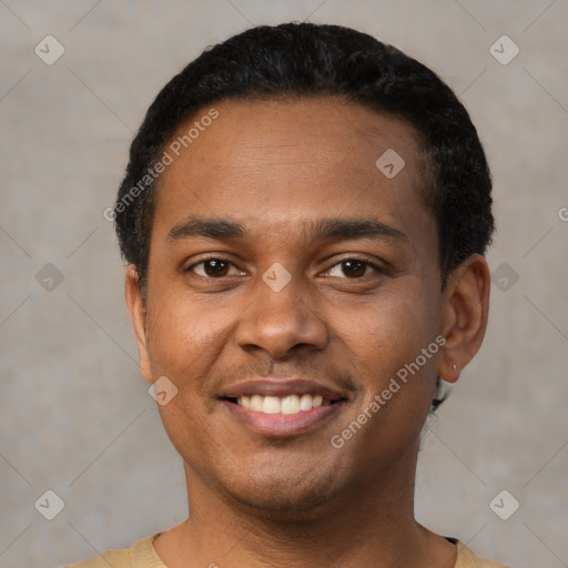 Joyful latino young-adult male with short  black hair and brown eyes