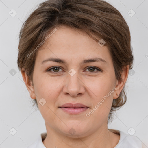 Joyful white adult female with medium  brown hair and brown eyes