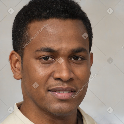 Joyful latino young-adult male with short  brown hair and brown eyes