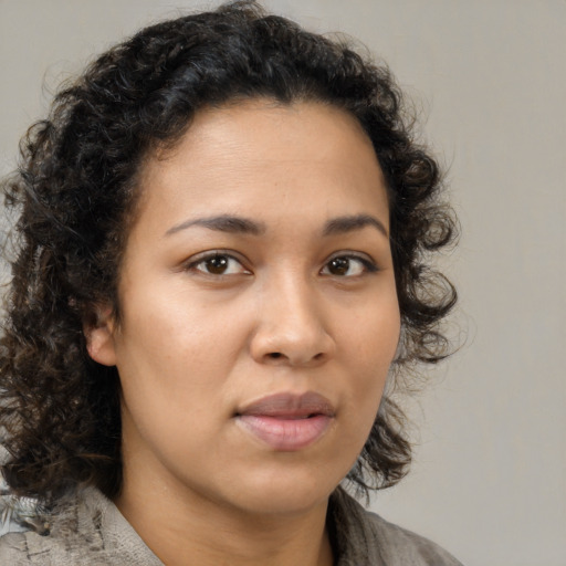 Neutral latino young-adult female with medium  brown hair and brown eyes