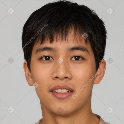 Joyful asian young-adult male with short  black hair and brown eyes