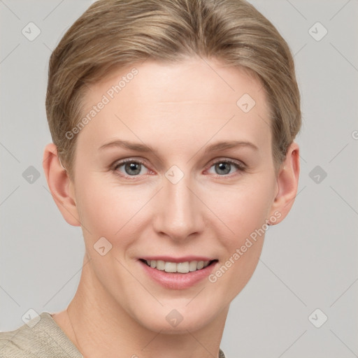 Joyful white young-adult female with short  brown hair and grey eyes