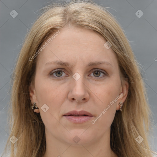 Joyful white adult female with medium  brown hair and grey eyes