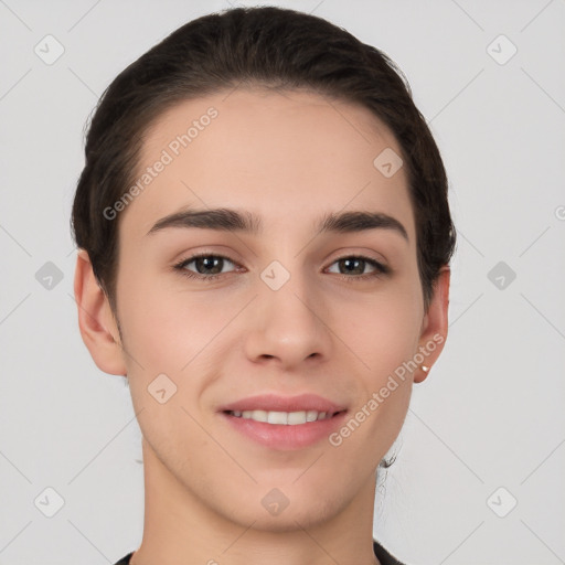 Joyful white young-adult female with short  brown hair and brown eyes