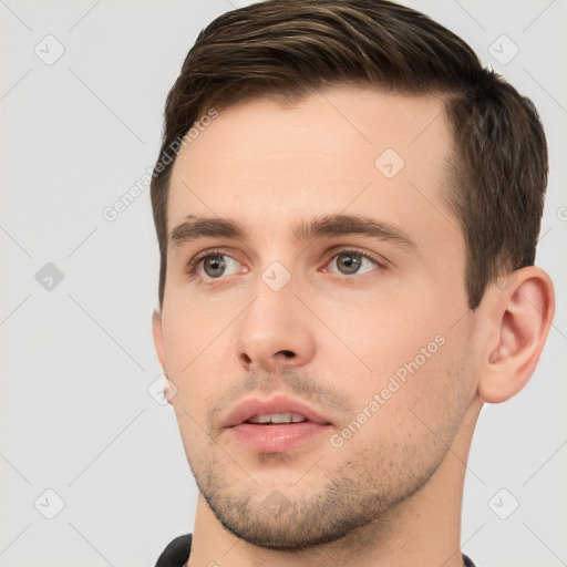 Neutral white young-adult male with short  brown hair and brown eyes