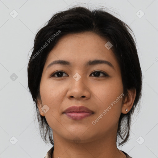 Joyful asian young-adult female with medium  black hair and brown eyes