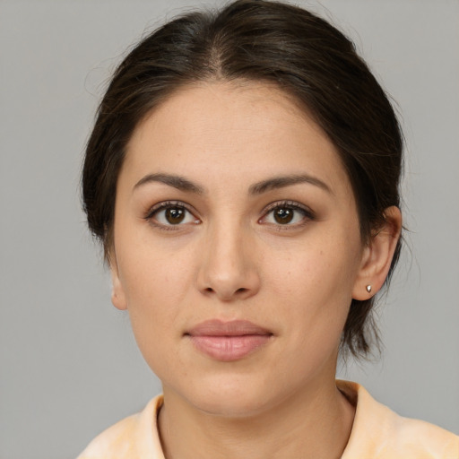 Neutral white young-adult female with medium  brown hair and brown eyes