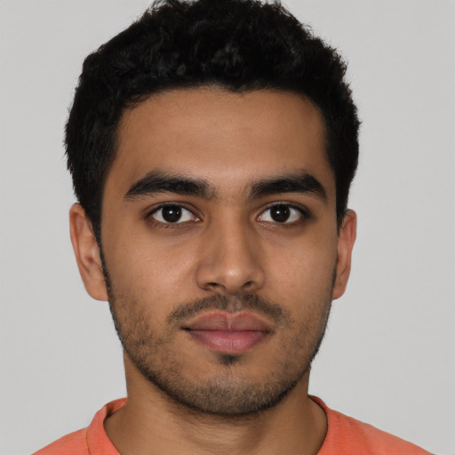 Neutral latino young-adult male with short  brown hair and brown eyes