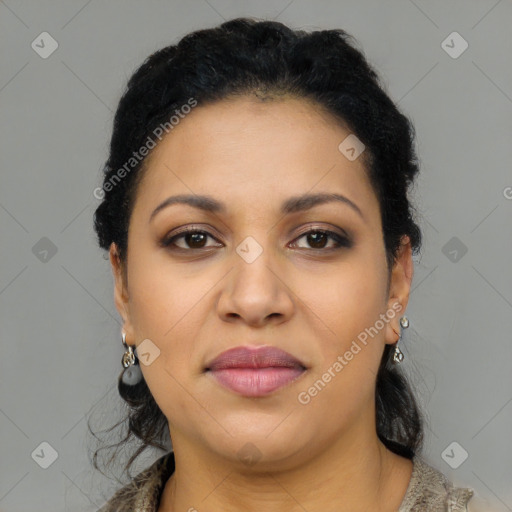 Joyful latino young-adult female with long  black hair and brown eyes