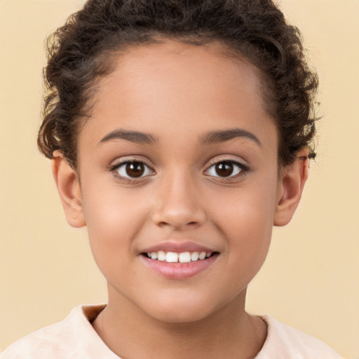 Joyful white child female with short  brown hair and brown eyes