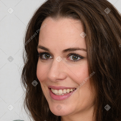 Joyful white young-adult female with long  brown hair and green eyes