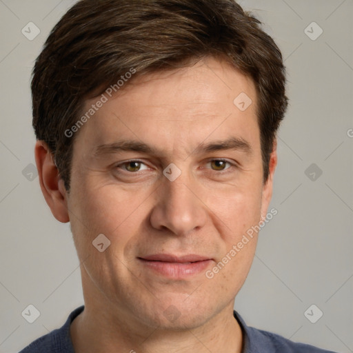 Joyful white adult male with short  brown hair and grey eyes