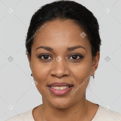 Joyful latino young-adult female with short  black hair and brown eyes