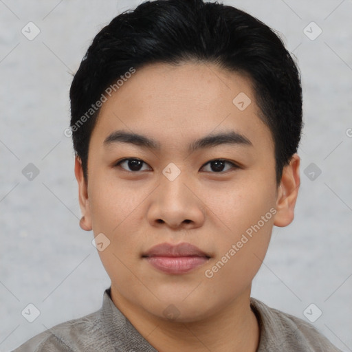 Joyful asian young-adult male with short  black hair and brown eyes