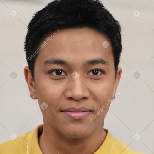 Joyful asian young-adult male with short  black hair and brown eyes