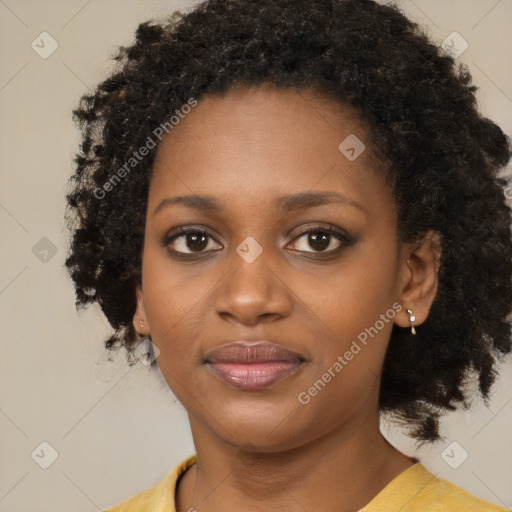 Joyful black young-adult female with medium  black hair and brown eyes