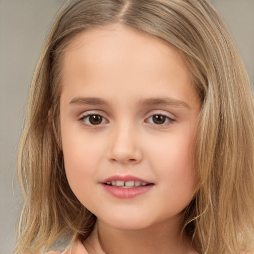 Joyful white child female with long  brown hair and brown eyes