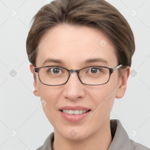 Joyful white young-adult female with short  brown hair and grey eyes