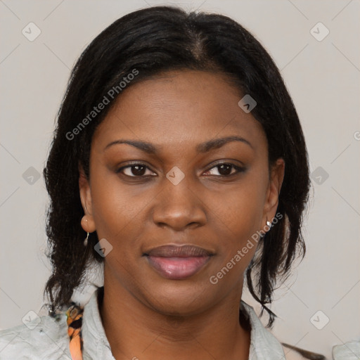 Joyful black young-adult female with medium  black hair and brown eyes